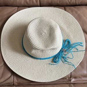Elegant Cream Sun Hat with Blue Accent